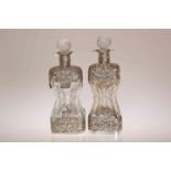A PAIR OF LATE VICTORIAN SILVER-MOUNTED WRYTHEN GLASS DECANTERS, William Comyns & Sons Ltd,