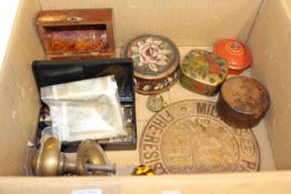 Coinage, bank notes, trinket boxes, brass circular fire plate, two door knobs,