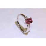 18 carat gold emerald-cut pink sapphire and round brilliant diamond shoulder ring,