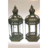 Pair of ornate metal and glazed hexagonal hall lanterns