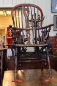 19th Century Windsor elm pierced splat back elbow chair