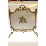 Ornate gilt metal fire guard