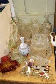 Collection of glassware including decanters, vases, bowls,