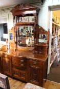 Late Victorian carved walnut mirror back sideboard,