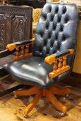 Blue deep buttoned leather swivel desk chair