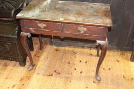 Georgian mahogany two drawer side table on cabriole legs,