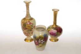 Two Royal Worcester vases, painted with roses; and a Royal Worcester blush ivory vase,