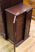 Two door collectors cabinet fitted with nine glazed panel top drawers, 43.