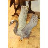 Large modern bronze of swan with outstretched wings