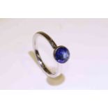 18 carat rubover single stone round sapphire ring, sapphire approximately 1.