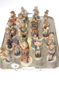 Collection of seventeen Hummel children figures and two others