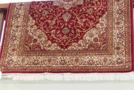 Keshan rug with a red ground 1.90 by 1.