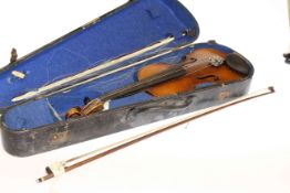 Vintage violin and two bows