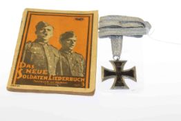WWII Nazi soldiers song book and WWII iron cross on silver band