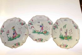 Three plates decorated in the Famille Rose palette with Chinese figures,