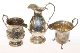 Two silver cream jugs and a small silver ewer (3) Gross 8oz