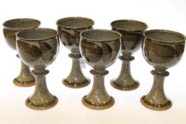 David Lloyd Jones (1928-1994), a set of six stoneware goblets, with Tenmoku glaze, seal marks,