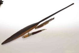 Carved tribal paddle, 92cm; dagger,