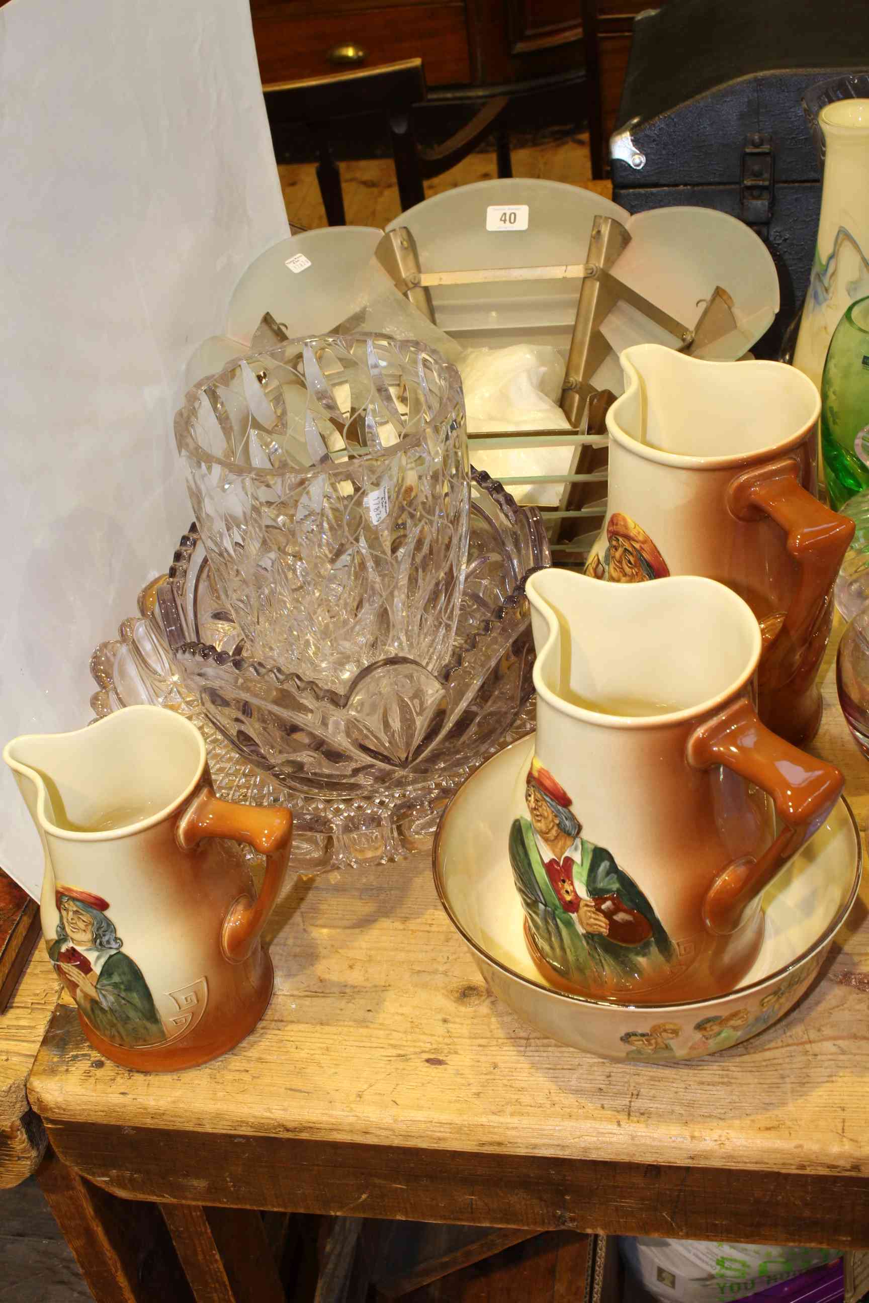 Three Royal Doulton jugs and bowl, two glass bowls,