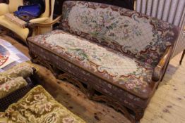 17th Century style carved walnut settee in Abusson type fabric,