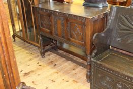 17th Century style carved oak two door cabinet,
