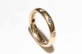 18 carat gold eight stone diamond ring
