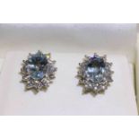 18 carat gold aquamarine and round brilliant diamond cluster earrings, aquamarine approximately 2.