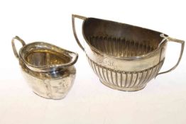Silver two-handled sugar bowl together with a silver cream jug (2) Gross 7.