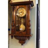 Small Victorian walnut cased Vienna wall clock