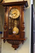 Small Victorian walnut cased Vienna wall clock