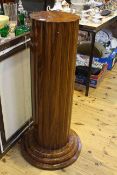 Pair Art Deco walnut pedestals of lobed circular outline on triple stepped bases,