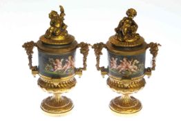 Pair of gilt metal urns and covers,