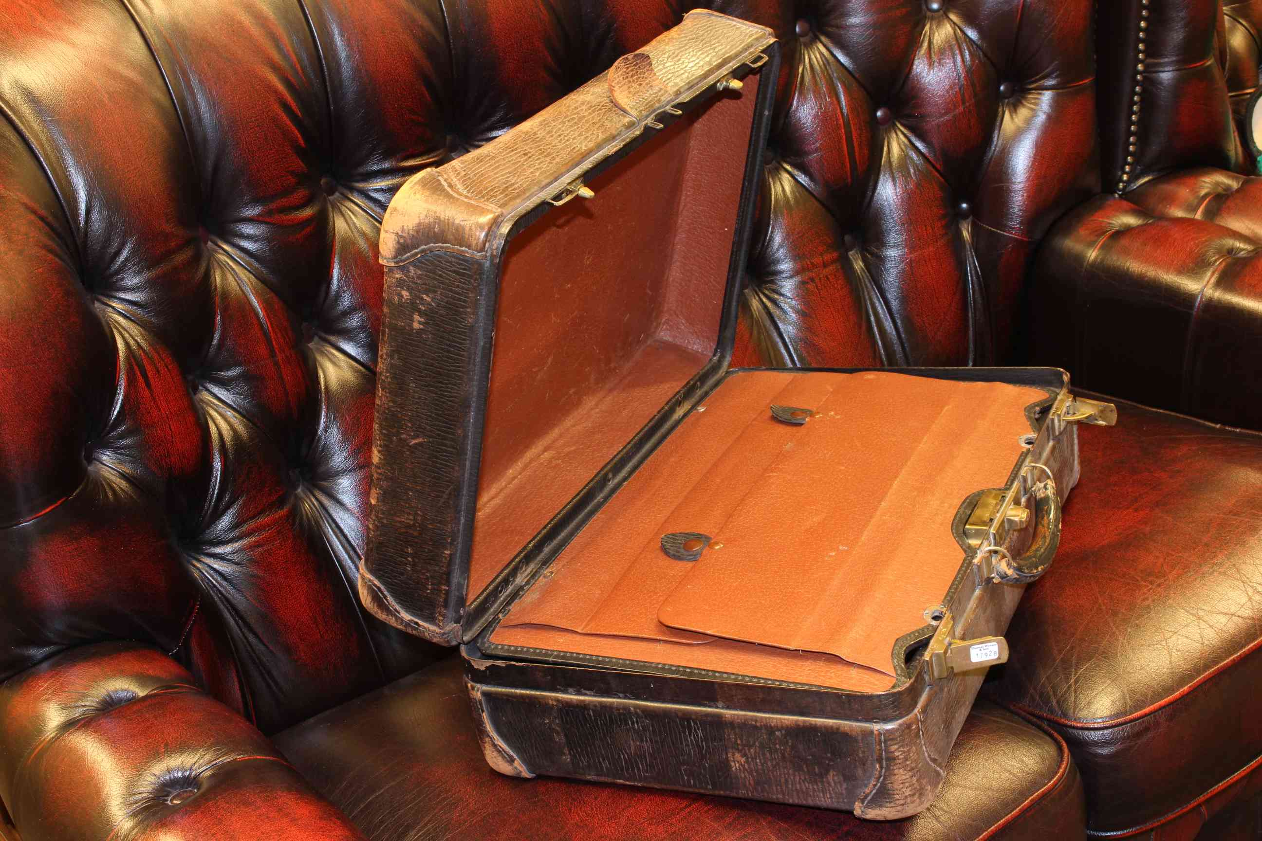 Vintage leather suitcase with fitted interior and shoe lasts