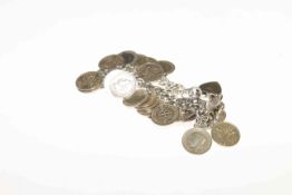 Bracelet with three pence pieces