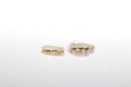 Two Chinese miniature ivory carvings, in the form of open shells,