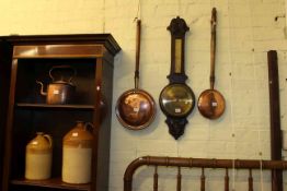 Two copper warming pans, oak barometer,