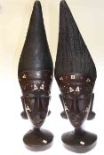 Pair of carved and inlaid African wood busts