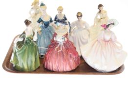 Eight Royal Doulton figures