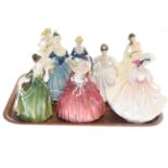 Eight Royal Doulton figures