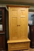 Bespoke oak carved rose and thistle double door wardrobe with well fitted base (apparently Nixons