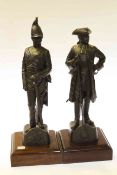 Pair of bronzed resin regimental figures
