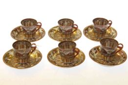 Set of six Japanese coffee cans and saucers,
