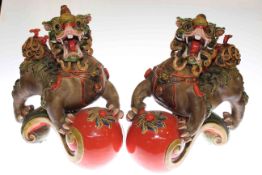 Pair of large ornate pottery dogs of fo
