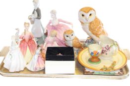 Clarice Cliff 'Sunshine' plate, three Royal Doulton figures, two Coalport figures, two Beswick owls,
