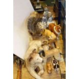 Two Melba Ware lions, Beswick dogs, two Nao figures,