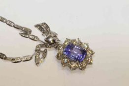 Fine 18 carat gold, tanzanite and round brilliant diamond cluster pendant on an 18 carat gold chain,