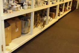 Full shelf of light fittings, glass, china, metalware, commemorative spoons,