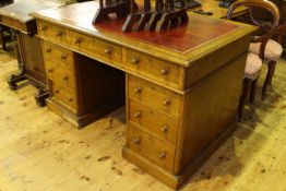 Late Victorian oak nine drawer pedestal desk,