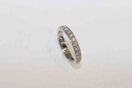 18 carat white gold and round brilliant diamond half eternity ring,