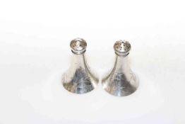 Pair of American sterling silver pepper pots by R.